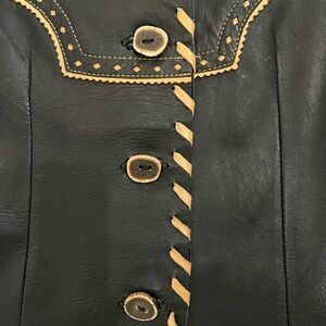 Leather embellished vest